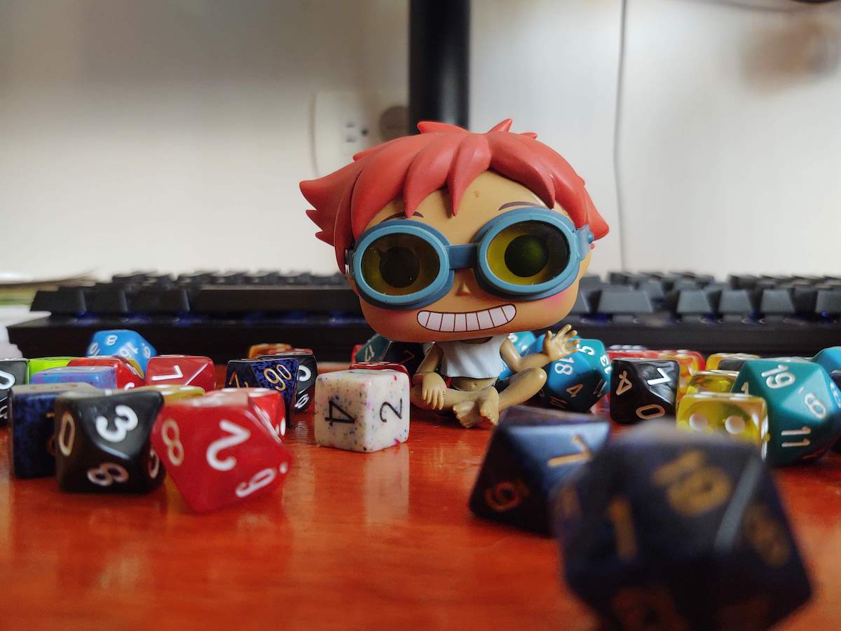 Cowboy Bebop's Ed Funko Pop Figure surrounded by dice