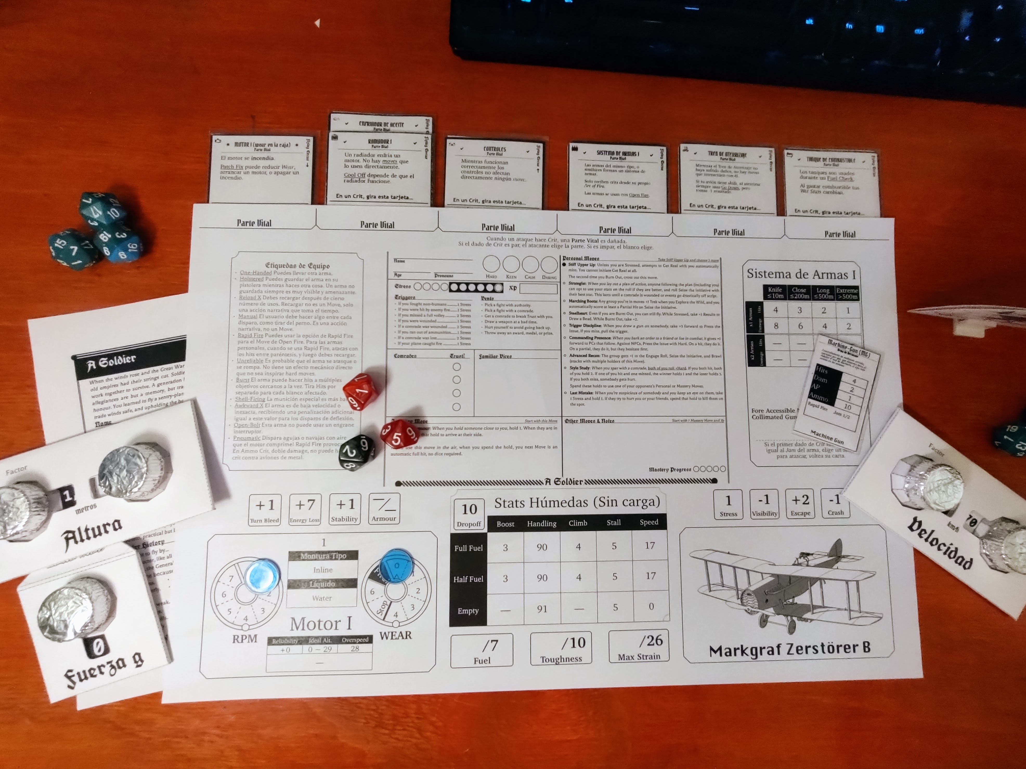 Un conjunto de diales, dados, tarjetas y un tablero de control de avión más grande